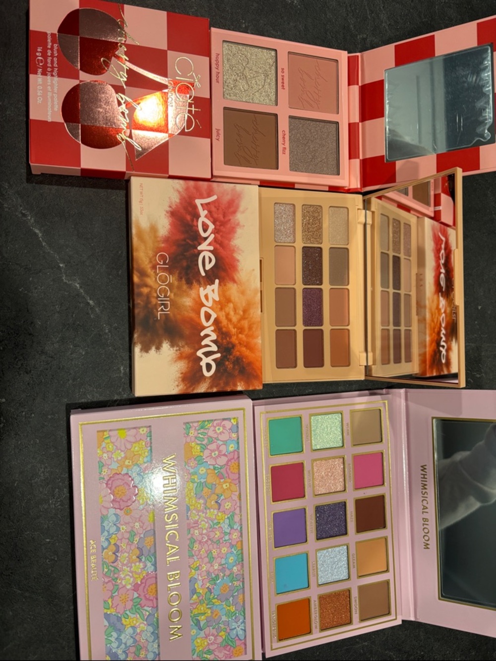 2 eyeshadow pallets and 1 blush and highlighter pallet. All new.